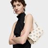 Εικόνα της Τσάντα TOUS Μικρή χιαστί Audree Eyelets σε μπεζ χρώμα 2002202901
